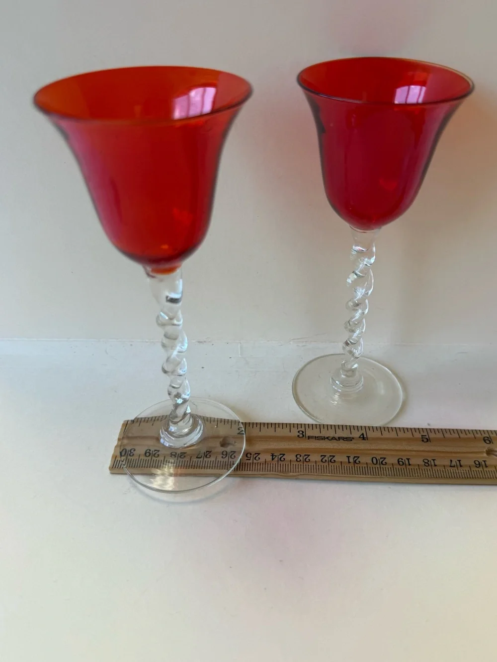 Vintage Pair of Orangy Red Apertif Glassware with Clear Twisted Stems.